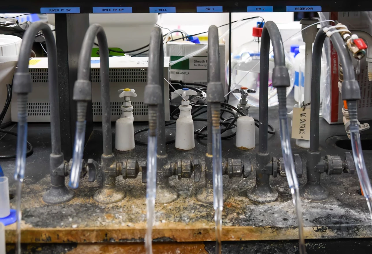 Raw water from wells and surface water sources run through taps in the Ann Arbor water treatment plant's lab for regular testing.